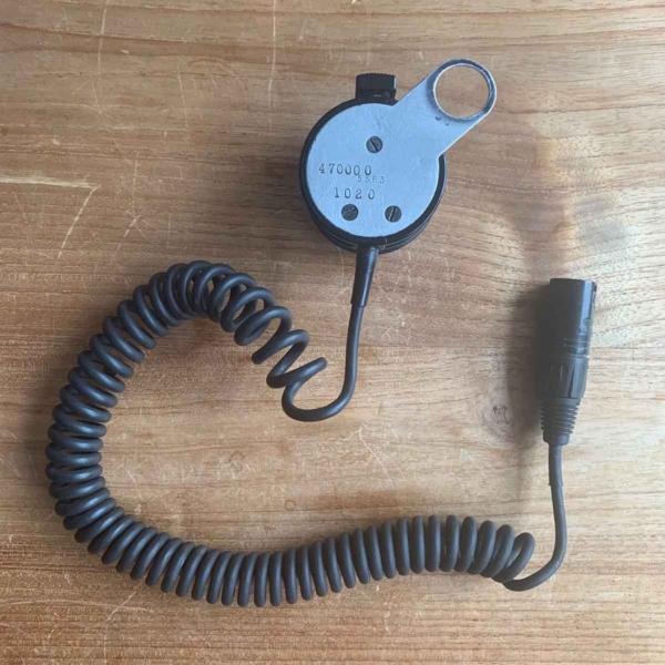 Back side of a handheld microphone that has been used in a KLM Boeing 747.