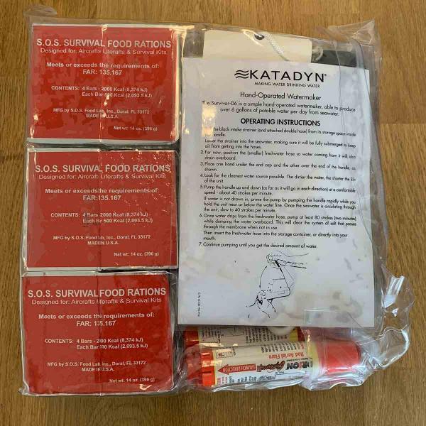 TAP Portugal Airbus A330 slide liferaft rescue kit food rations and flares.