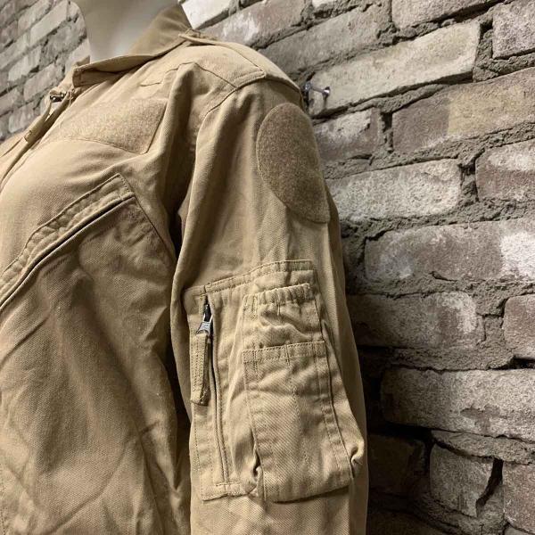 Sand coloured aircrew flightsuit left side view.