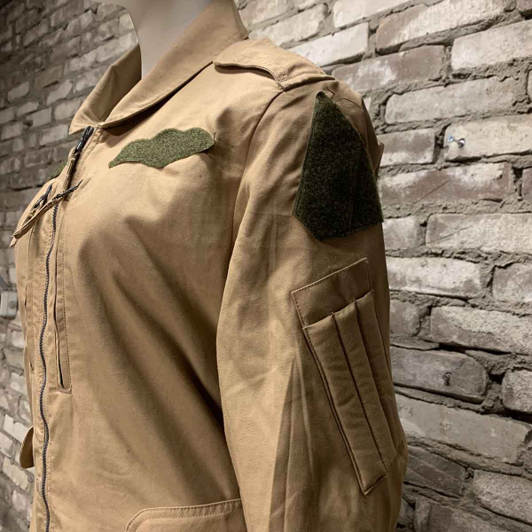 Sand coloured aircrew flightsuit left side view.