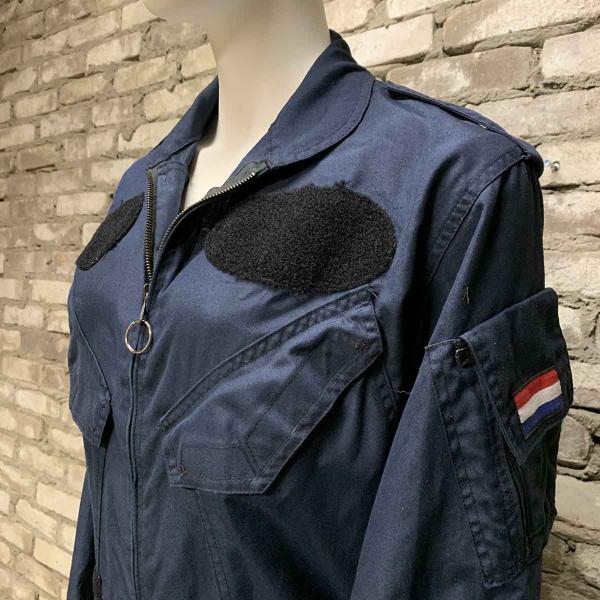 Blue coloured aircrew flightsuit left side view.