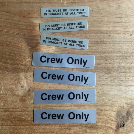 Metal crew only sign for aircraft for sale.