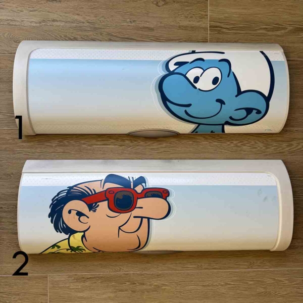 Brussels Airlines Airbus A320 OO-SND Aerosmurf luggage bin doors with Smurfs figures for sale.